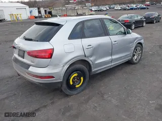 2017 Audi Q3 Premium with VIN WA1ECCFS1HR014286, listed as a IAAI auction lot 41582743 with 105,585 mi miles. Bid and sale history available at carsss.com. Image 4.