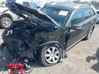 2012 Kia Sorento LX with VIN 5XYKT3A62CG306961, listed as a IAAI auction lot 41858307 with 152,344 mi miles. Bid and sale history available at carsss.com. Image 2.