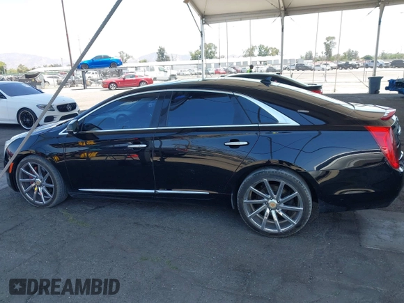 2013 Cadillac XTS Luxury with VIN 2G61P5S35D9105460, listed as a IAAI auction lot 42582313 with 144,895 mi miles and . Bid and sale history available at DreamBid. Image 14.