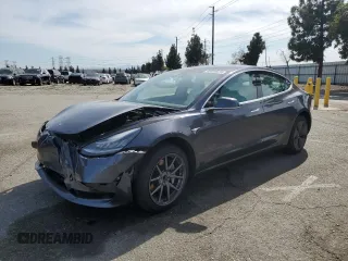 2019 Tesla Model 3 Mid Range with VIN 5YJ3E1EA0KF445185, listed as a Copart auction lot 48630675 with 76,351 mi miles and Salvage Title. Bid and sale history available at carsss.com. Image 1.
