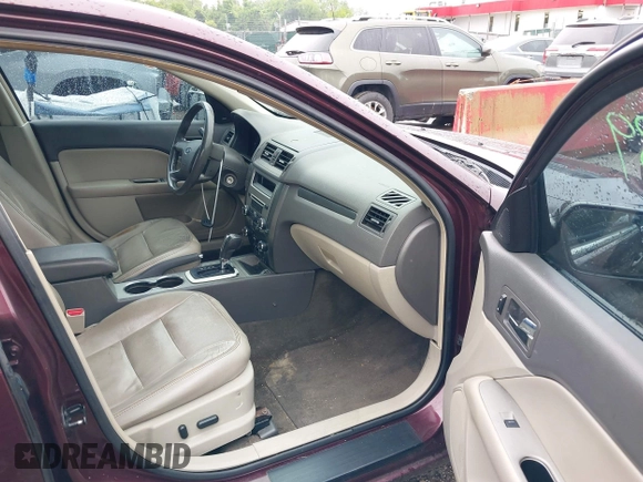 2012 Ford Fusion SEL z VIN 3FAHP0JG3CR443568, wystawiony jako IAAI lot #42335839 z przebiegiem 134 700 mil mil oraz . Historia ofert i sprzedaży dostępna na DreamBid. Obrazek 5.