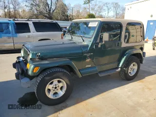 2000 Jeep Wrangler Sahara with VIN 1J4FA59S0YP795198, listed as a Copart auction lot 87920205 with 150,148 mi miles and Salvage Title. Bid and sale history available at carsss.com. Image 1.