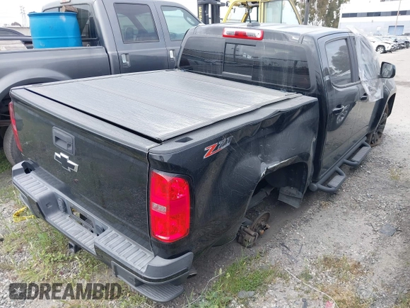 2019 Chevrolet Colorado 4WD Z71 with VIN 1GCGTDEN5K1289956, listed as a IAAI auction lot 41729406 with 60,887 mi miles. Bid and sale history available at carsss.com. Image 4.