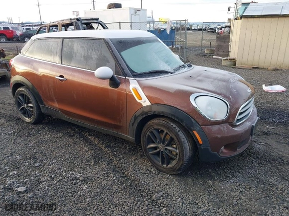 2014 MINI Cooper Paceman with VIN WMWSS1C58EWN94368, listed as a IAAI auction lot 41377194 with 56897 miles. Bid and sale history available at carsss.com. Image 1.