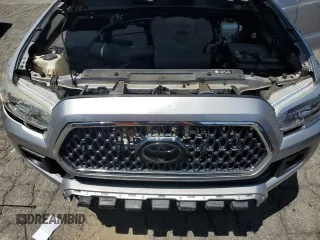 2019 Toyota Tacoma SR with VIN 3TMCZ5AN2KM277551, listed as a Copart auction lot 61586585 with 59,670 mi miles and Salvage title. Bid and sale history available at DreamBid. Image 11.