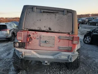 2012 Jeep Wrangler Unlimited Sport with VIN 1C4HJWDG7CL114297, listed as a Copart auction lot 42144525 with 165,482 mi miles and Salvage Title. Bid and sale history available at carsss.com. Image 6.