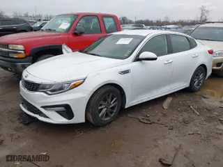 2020 Kia Optima LX with VIN 5XXGT4L32LG382053, listed as a IAAI auction lot 41741903 with 147,428 mi miles. Bid and sale history available at carsss.com. Image 2.