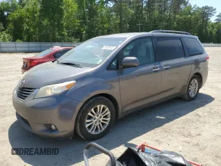 2014 Toyota Sienna XLE with VIN 5TDYK3DC6ES473747, listed as a Copart auction lot 53828345 with 251,390 mi miles and Clean Title. Bid and sale history available at carsss.com. Image 1.