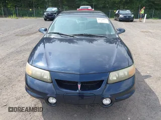 2002 Pontiac Bonneville SLE z VIN 1G2HY54K524175736, wystawiony jako IAAI lot #42730873 z przebiegiem 115 308 mil mil oraz . Historia ofert i sprzedaży dostępna na DreamBid. Obrazek 6.