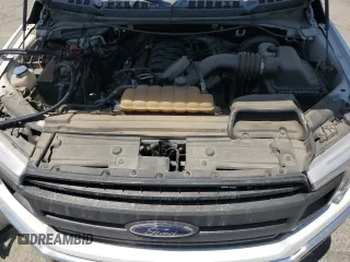 2018 Ford F-150 XL z VIN 1FTEX1C52JKE31993, wystawiony jako Copart lot #54867525 z przebiegiem 121 290 mil mil oraz Szkoda całkowita • Salvage title. Historia ofert i sprzedaży dostępna na DreamBid. Obrazek 11.