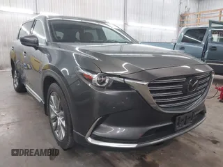 2018 Mazda CX-9 Signature with VIN JM3TCBEY4J0201097, listed as a IAAI auction lot 42159192 with 87,472 mi miles and . Bid and sale history available at DreamBid. Image 1.