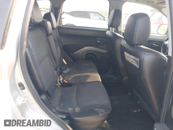 2009 Mitsubishi Outlander SE with VIN JA4LT31W09Z014816, listed as a IAAI auction lot 42399219 with 188,136 mi miles and . Bid and sale history available at DreamBid. Image 8.