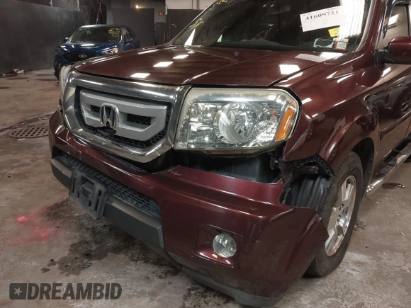 2009 Honda Pilot EX-L with VIN 5FNYF48569B021586, listed as a IAAI auction lot 41609721 with 291,598 mi miles. Bid and sale history available at carsss.com. Image 6.