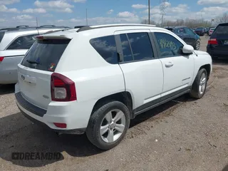 2016 Jeep Compass Latitude with VIN 1C4NJDEB1GD616457, listed as a IAAI auction lot 41962493 with 80,717 mi miles and . Bid and sale history available at DreamBid. Image 4.