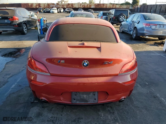 2011 BMW Z4 sDrive35is with VIN WBALM1C54BE393857, listed as a Copart auction lot 72769234 with NaN miles and Salvage Title. Bid and sale history available at carsss.com. Image 6.