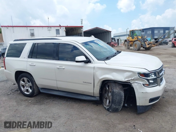 2015 Chevrolet Tahoe LT with VIN 1GNSCBKC0FR739951, listed as a IAAI auction lot 42332982 with 133,046 mi miles and . Bid and sale history available at DreamBid. Image 13.