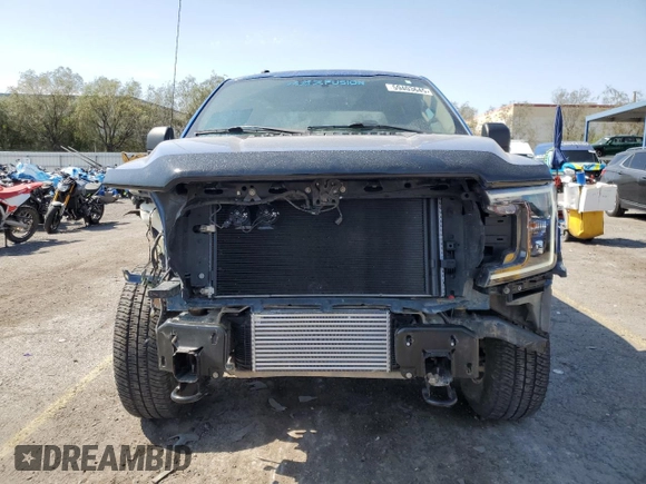 2018 Ford F-150 XL with VIN 1FTEW1EGXJKD26409, listed as a Copart auction lot 59403645 with 122,373 mi miles and Salvage title. Bid and sale history available at DreamBid. Image 5.