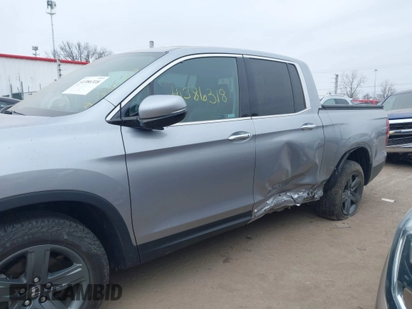 2021 Honda Ridgeline RTL-E with VIN 5FPYK3F79MB010091, listed as a IAAI auction lot 41386318 with 37,996 mi miles and . Bid and sale history available at DreamBid. Image 6.
