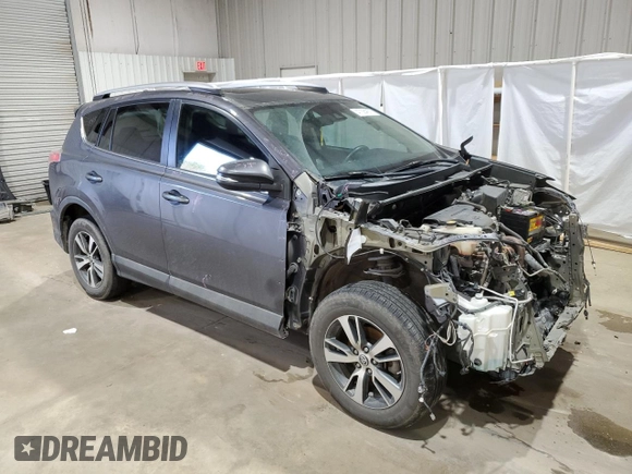 2018 Toyota RAV4 XLE with VIN 2T3WFREV3JW423623, listed as a Copart auction lot 47364675 with 132,510 mi miles and Salvage Title. Bid and sale history available at DreamBid. Image 4.