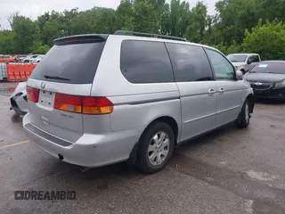 2004 Honda Odyssey EX-L with VIN 5FNRL18934B076486, listed as a IAAI auction lot 42315160 with 209,467 mi miles and . Bid and sale history available at DreamBid. Image 4.