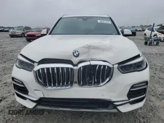 2019 BMW X5 xDrive40i z VIN 5UXCR6C56KLL40086, wystawiony jako Copart lot #58301335 z przebiegiem Nie podano mil oraz Szkoda całkowita • Salvage title. Historia ofert i sprzedaży dostępna na DreamBid. Obrazek 5.