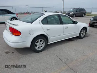 2003 Oldsmobile Alero GL1 z VIN 1G3NL52F83C155832, wystawiony jako IAAI lot #41895654 z przebiegiem 199 024 mil mil oraz . Historia ofert i sprzedaży dostępna na DreamBid. Obrazek 4.