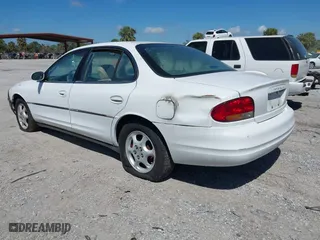 1998 Oldsmobile Intrigue GL with VIN 1G3WS52K0WF337239, listed as a IAAI auction lot 41843397 with 130,301 mi miles. Bid and sale history available at carsss.com. Image 3.