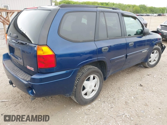 2003 GMC Envoy SLT z VIN 1GKDS13S532309264, wystawiony jako IAAI lot #42200597 z przebiegiem 86 728 mil mil oraz . Historia ofert i sprzedaży dostępna na DreamBid. Obrazek 4.