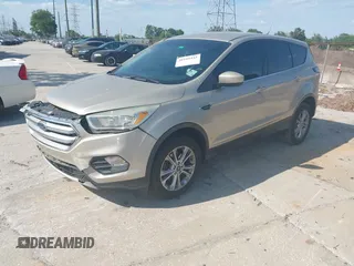 2017 Ford Escape SE z VIN 1FMCU0GD8HUC60074, wystawiony jako IAAI lot #41918443 z przebiegiem 85 787 mil mil oraz . Historia ofert i sprzedaży dostępna na DreamBid. Obrazek 23.