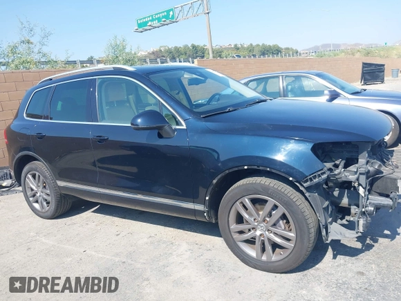 2016 Volkswagen Touareg Sport with VIN WVGEF9BP7GD010252, listed as a IAAI auction lot 42465165 with Not provided miles and . Bid and sale history available at DreamBid. Image 14.
