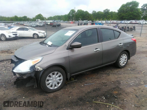 2015 Nissan Versa SV with VIN 3N1CN7AP7FL869485, listed as a IAAI auction lot 42077524 with 198,646 mi miles. Bid and sale history available at carsss.com. Image 2.
