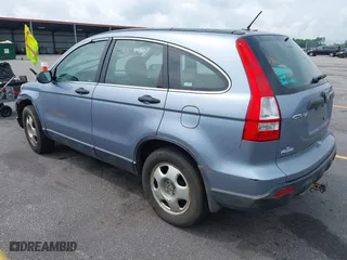 2007 Honda CR-V LX with VIN JHLRE48317C057561, listed as a IAAI auction lot 42119266 with 307,373 mi miles. Bid and sale history available at carsss.com. Image 3.