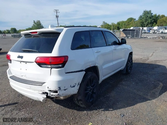 2021 Jeep Grand Cherokee Laredo X with VIN 1C4RJFAG7MC828165, listed as a IAAI auction lot 39970936 with 81,115 mi miles. Bid and sale history available at carsss.com. Image 4.
