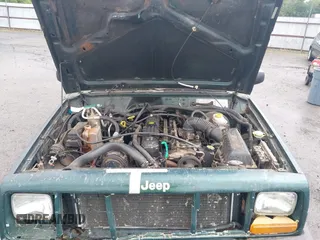 2000 Jeep Cherokee with VIN 1J4FT48S4YL240347, listed as a IAAI auction lot 42361311 with Not provided miles and . Bid and sale history available at DreamBid. Image 10.
