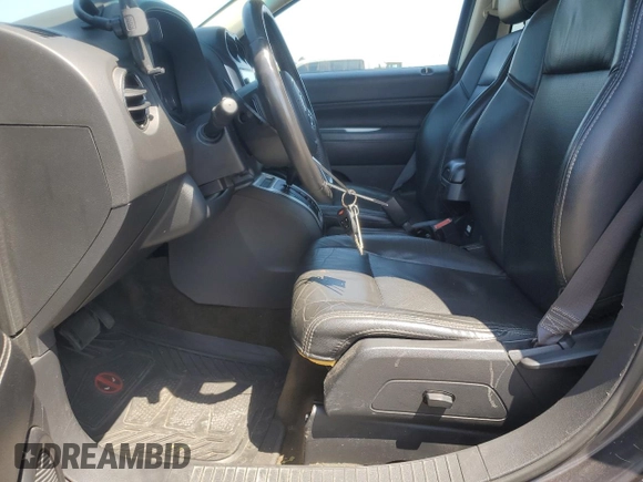 2016 Jeep Compass High Altitude with VIN 1C4NJDEB0GD709177, listed as a Copart auction lot 61248065 with 45,558 mi miles and Salvage title. Bid and sale history available at DreamBid. Image 7.