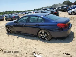 2019 BMW 6 Series 650i with VIN WBA6D4C54KGA01093, listed as a Copart auction lot 61496984 with 23,951 mi miles and Salvage Title. Bid and sale history available at carsss.com. Image 2.