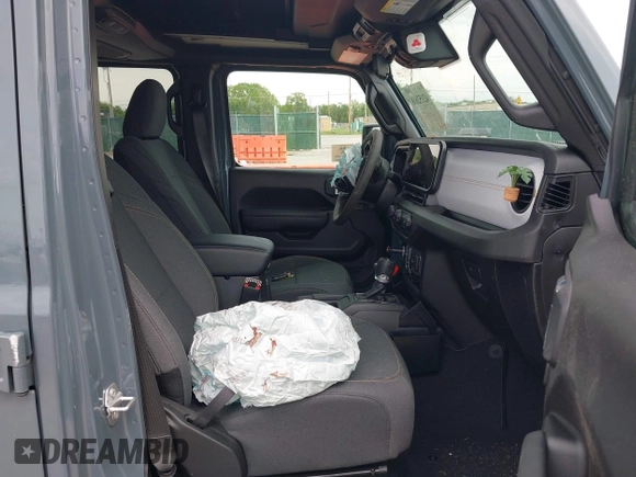 2024 Jeep Wrangler Sport S with VIN 1C4PJXDG4RW353640, listed as a IAAI auction lot 42152688 with Not provided miles and . Bid and sale history available at DreamBid. Image 5.