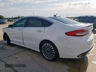 2017 Ford Fusion Titanium с VIN 3FA6P0K99HR118082, выставлен на аукционе Copart как лот 55459615 с пробегом 89 148 миль миль и Чистый • Clean title. История ставок и продаж доступна на DreamBid. Изображение 2.