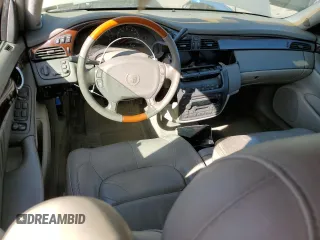 2001 Cadillac DeVille DHS z VIN 1G6KE57Y21U250470, wystawiony jako Copart lot #57334785 z przebiegiem 66 703 mil mil oraz Tytuł czysty. Historia ofert i sprzedaży dostępna na DreamBid. Obrazek 8.