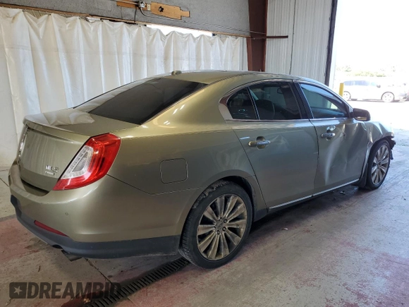 2013 Lincoln MKS EcoBoost with VIN 1LNHL9FT2DG604657, listed as a Copart auction lot 65357735 with 133,548 mi miles and Salvage title. Bid and sale history available at DreamBid. Image 3.