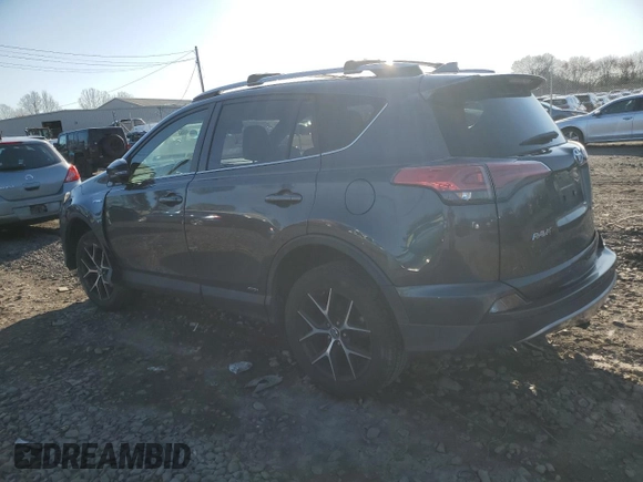 2018 Toyota RAV4 Hybrid SE with VIN JTMJJREV5JD210274, listed as a Copart auction lot 52450645 with 108,249 mi miles and Salvage title. Bid and sale history available at DreamBid. Image 2.