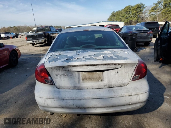 2000 Ford Taurus z VIN 1FAFP5229YA185193, wystawiony jako Copart lot #47105955 z przebiegiem 61 522 mil mil oraz Szkody całkowita. Historia ofert i sprzedaży dostępna na DreamBid. Obrazek 6.