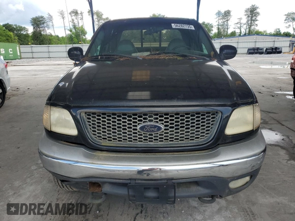 2001 Ford F-150 XLT z VIN 1FTRW08L31KE62434, wystawiony jako Copart lot #56282735 z przebiegiem Nie podano mil oraz Czysty tytuł • Clean title. Historia ofert i sprzedaży dostępna na DreamBid. Obrazek 5.