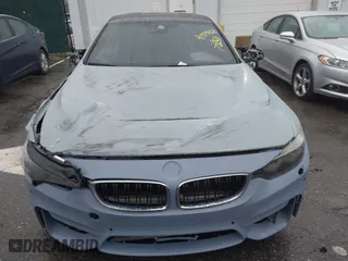 2017 BMW M4 with VIN WBS3R9C53HK709173, listed as a IAAI auction lot 41978162 with 105,427 mi miles. Bid and sale history available at carsss.com. Image 12.