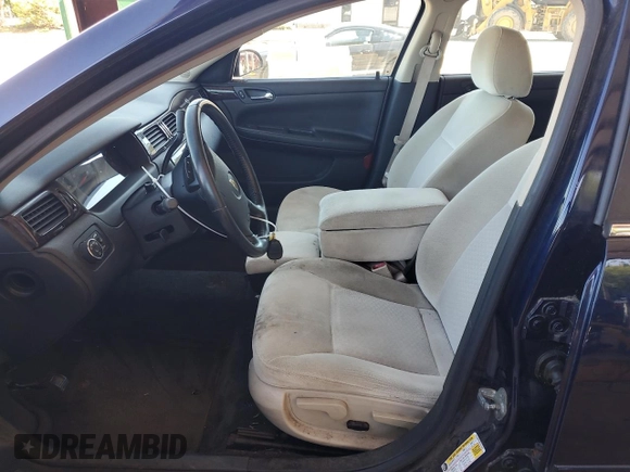 2012 Chevrolet Impala LS Retail with VIN 2G1WA5E35C1217567, listed as a Copart auction lot 57729315 with 129,346 mi miles and Salvage title. Bid and sale history available at DreamBid. Image 7.