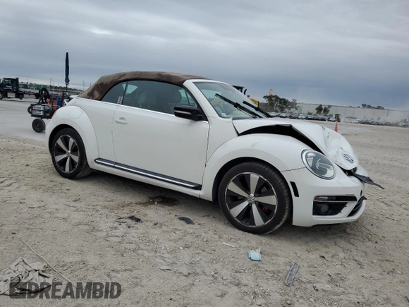 2013 Volkswagen Beetle with VIN 3VW7S7AT9DM816943, listed as a Copart auction lot 88466695 with 77,265 mi miles and Salvage Title. Bid and sale history available at DreamBid. Image 4.