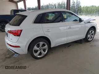 2021 Audi Q5 Premium Plus z VIN WA1BAAFY5M2004171, wystawiony jako IAAI lot #42140899 z przebiegiem 62 544 mil mil oraz . Historia ofert i sprzedaży dostępna na DreamBid. Obrazek 4.