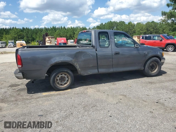 2004 Ford F-150 XL with VIN 2FTRX17W54CA32203, listed as a Copart auction lot 61666385 with Not provided miles and Salvage title. Bid and sale history available at DreamBid. Image 3.