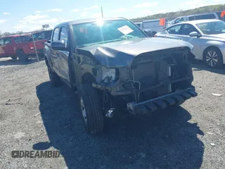 2017 Toyota Tacoma SR z VIN 5TFAX5GN5HX091428, wystawiony jako IAAI lot #41980145 z przebiegiem 60 065 mil mil oraz . Historia ofert i sprzedaży dostępna na DreamBid. Obrazek 1.