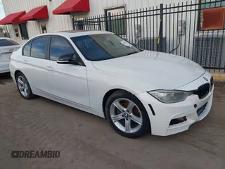 2015 BMW 3 Series 320i with VIN WBA3B1G50FNT04520, listed as a IAAI auction lot 41343158 with 172,688 mi miles. Bid and sale history available at carsss.com. Image 1.